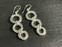 Triple layer multi circle silver drop earrings with open loop