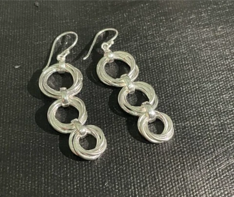 Triple layer multi circle silver drop earrings with open loop