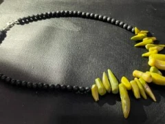 Necklace yellow - green chilli shape coral and black lava stone bead