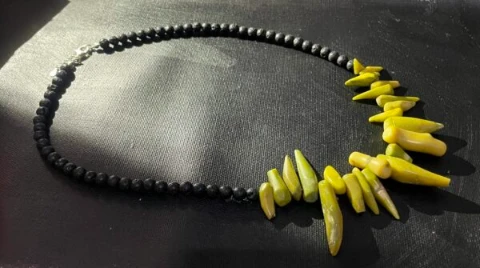 Necklace yellow - green chilli shape coral and black lava stone bead