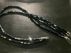Necklace in black glass bead and silver chain ends