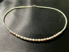 Necklace in baroque white pearl and jade green glass beads