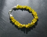 Bracelet yellow-green coral and white lava stone beads