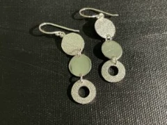 Circle drop earrings in hammered finish silver