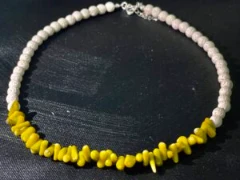 Necklace in yellow-green coral and white lava stone