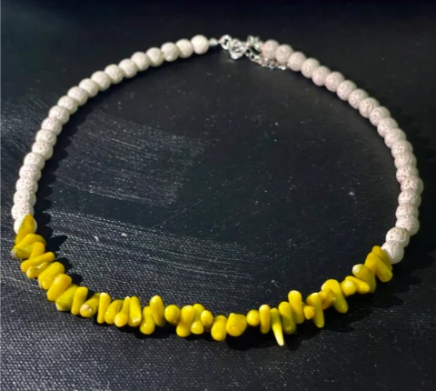 Necklace in yellow-green coral and white lava stone