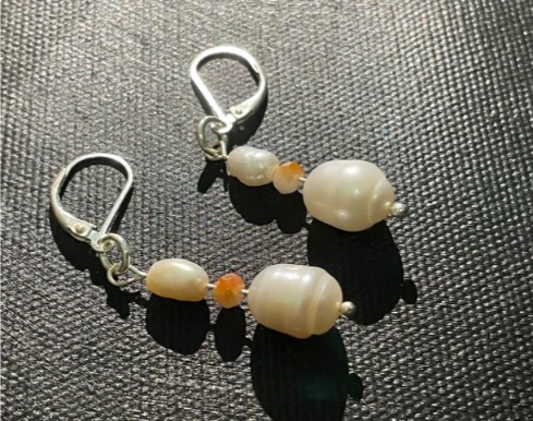 Earrings in white baroque pearl orange crystal and silver closed hoop