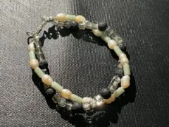 Double twist bracelet in white baroque pearl