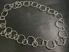 Long chain in multiple circle links with marked surface in 925 silver