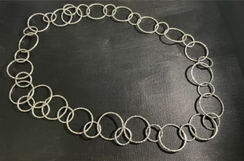 Long chain in multiple circle links with marked surface in 925 silver