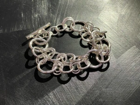 Artisanal designed multi circle unisex bracelet with toggle clasp  in solid silver