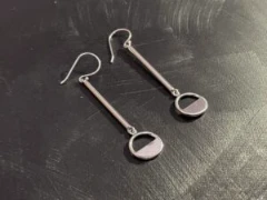 Long drop earrings with half circle motif in full silver
